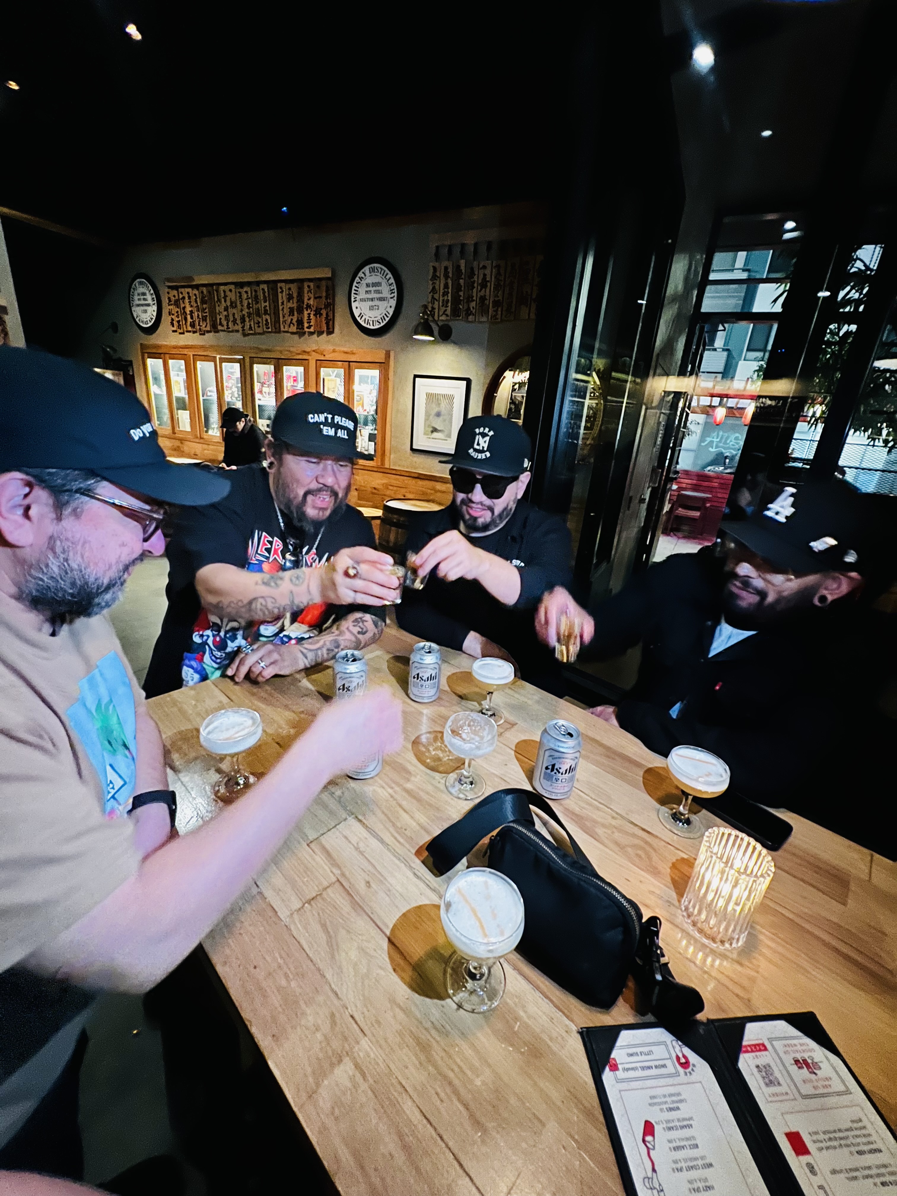 A photo of the boys again having a drink